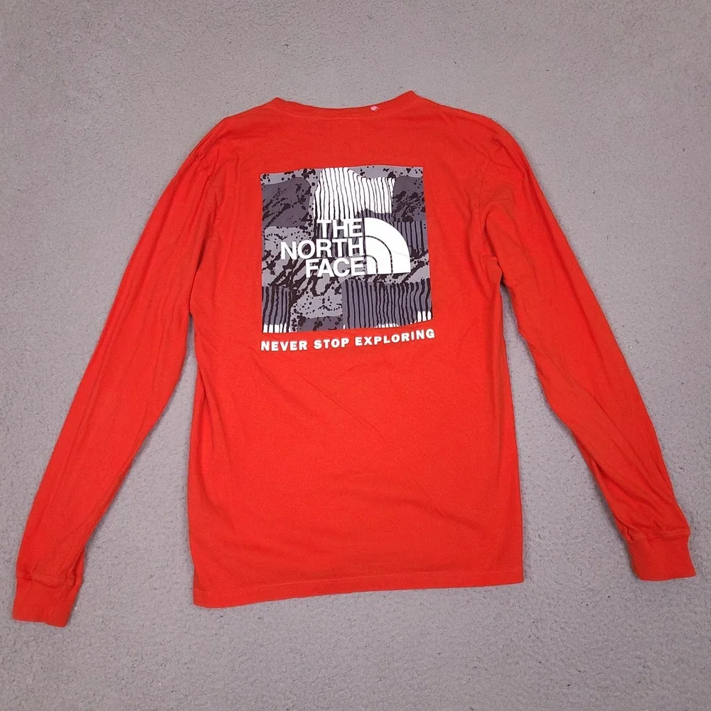 The North Face T-Shirt Mens Small Orange Circular Design Long Sleeve Graphic‎